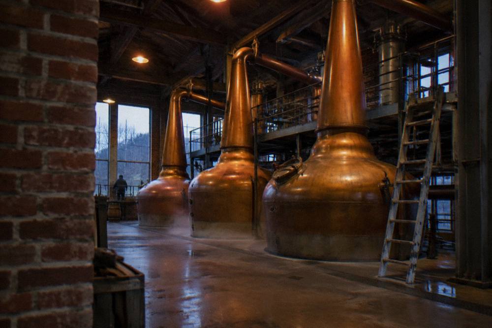 Copper pot stills inside a working Kentucky distillery