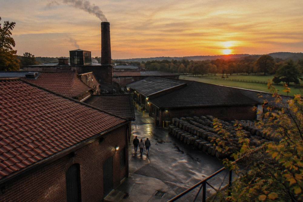 Sunset light over Bardstown rooftops and distillery buildings