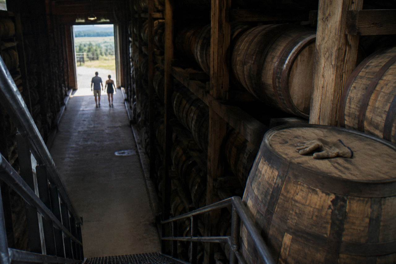 A rack of bourbon barrels stacked in a Kentucky rickhouse