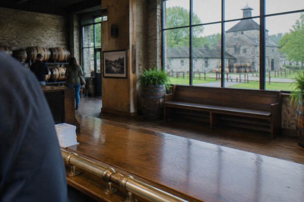 A visitor center booking desk with wooden counters in a Kentucky distillery