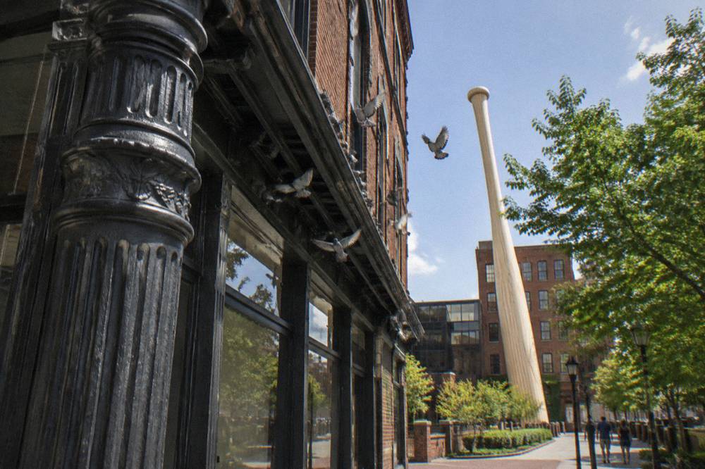 Cast-iron storefront facades along a historic Main Street block in Louisville
