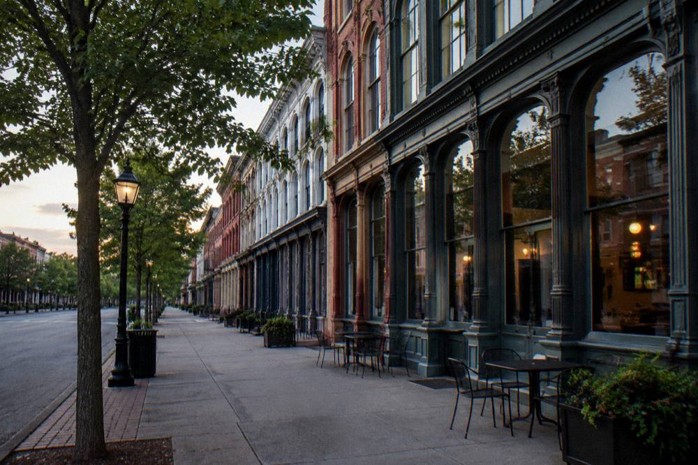 Historic cast-iron storefronts along a Louisville street