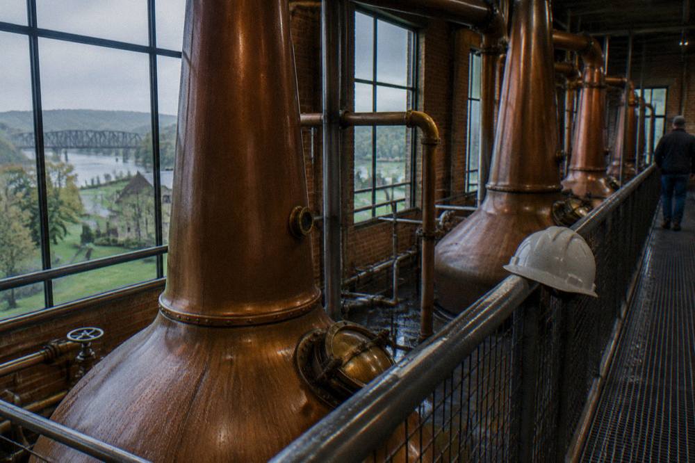 Copper column stills inside a working Kentucky distillery